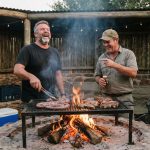 Locals enjoying a traditional South African Braai in a safari boma, learning South African Safari Lingo.